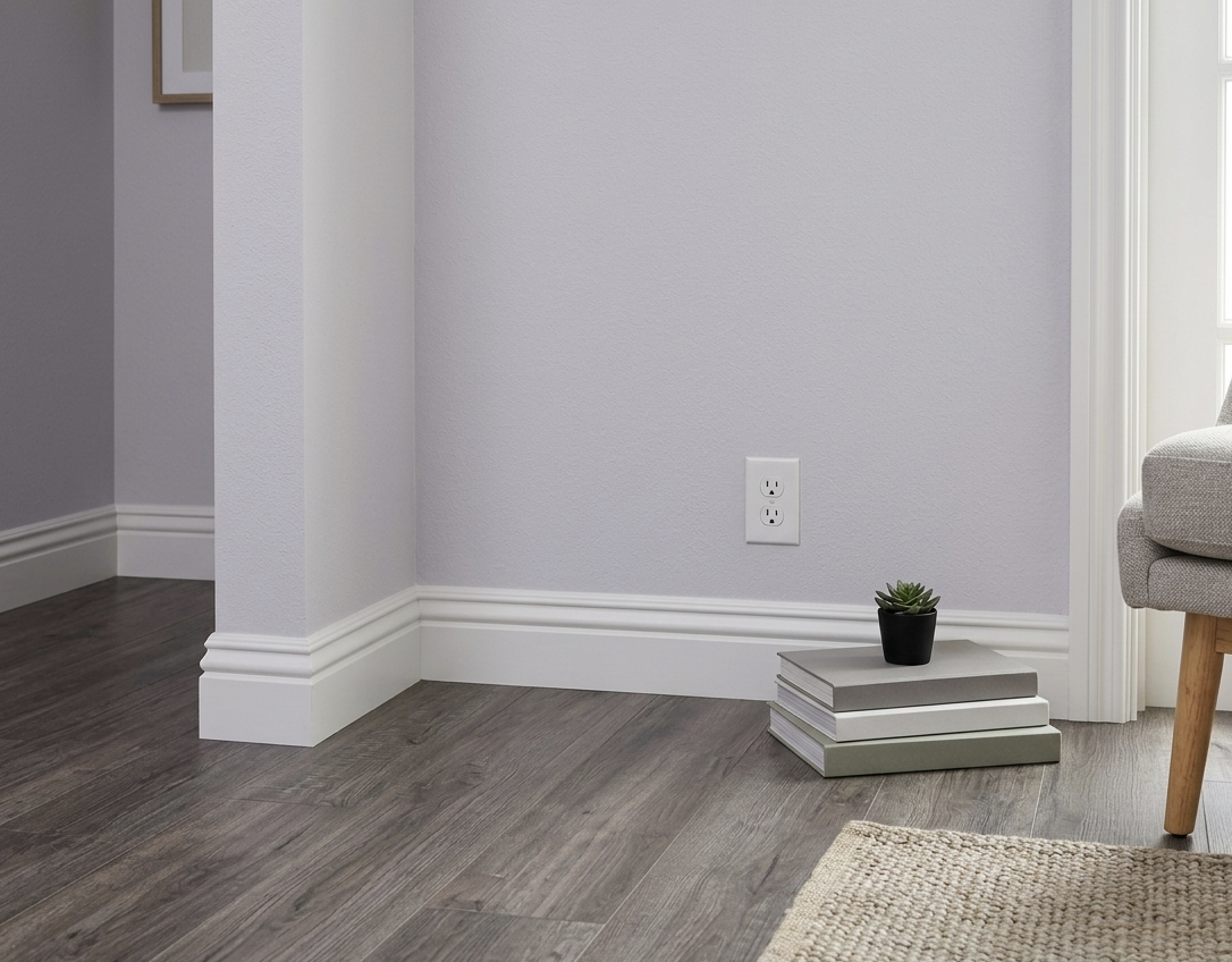 Drywall wall repair article preview with finished wall, outlet, and baseboard